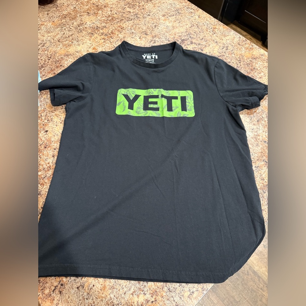 Yeti Black Tee with Vibrant Green Logo